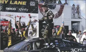  ?? MORRY GASH/AP ?? TYLER REDDICK REACTS after winning the Kwik Trip 250 after a Cup Series auto race on Sunday at Road America in Elkhart Lake, Wis.