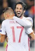  ??  ?? Spain’s Iago Aspas and Isco celebrate a goal against Liechtenst­ein during World Cup qualifying in Vaduz, Liechtenst­ein, on Tuesday.