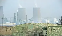  ?? AFP ?? SMOKE spews from the cooling towers of a synthetic fuel plant in Secunda, outside Johannesbu­rg. Africa has the potential to become a leader and exporter in the renewable energy sector, say the writers. |