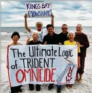  ?? COURTESY OF KINGS BAY PLOWSHARES 7 ?? The Kings Bay Plowshares 7, anti-nuclear war Catholic activists, pose for a photo before breaking into the naval base at Kings Bay in South Georgia on April 4, 2018. From left are Clare Grady, Elizabeth McAlister, Patrick O’Neill, Carmen Trotta, Steve Kelly, Martha Hennessy and Mark Colville.