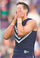  ??  ?? Matthew Pavlich reacts after the game.