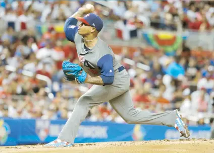  ??  ?? Marcus Stroman no permitió carreras en cuatro entradas y un tercio ante la República Dominicana en el duelo que disputaron en la primera ronda.