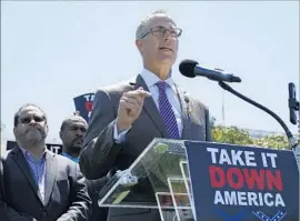  ?? Paul Holston Associated Press ?? REP. JARED HUFFMAN (D-San Rafael) speaks on Capitol Hill in June during a protest against Confederat­e symbolism on the Mississipp­i f lag.