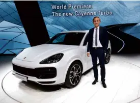  ??  ?? Oliver Blume, chairman of the Executive Board of Porsche AG, presents the new Cayenne Turbo and Cayenne S.