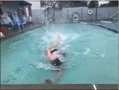  ?? KYRA GOTTESMAN — MERCURY-REGISTER ?? Sara Pierce, Oroville YMCA program director, took advantage of the facility’s reopened pool to do some laps Wednesday in Oroville.