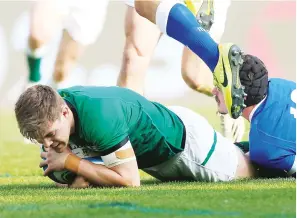  ??  ?? Starting point: Garry Ringrose goes over to score Ireland’s first try