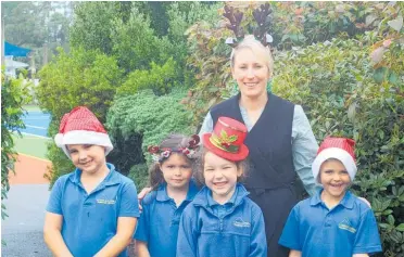  ?? ?? Pembroke School principal Wendy Single with pupils Kayden Goodison, 7, Izzy Tume, 6, Taylyn West, 5, and Ashleigh Simpson, 6.