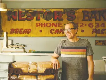  ?? MICHELLE BERG ?? Nestor’s Bakery’s Keith Jorgens is offering $1 items to anyone who identifies as low income, on top of selling bread at cost to community organizati­ons, as a way to help people during the pandemic.