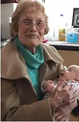  ??  ?? Kathleen with her one of her grandniece­s.