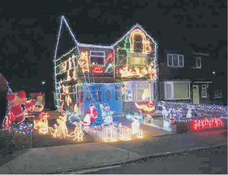  ??  ?? Neil’s house is covered in over 6000 lights to raise money for his 8-year-old neighbour William.