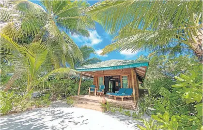  ?? Pictures: Supplied ?? TAKE IT EASY The landing jetty at the resort, above, and one of the laid-back villas.