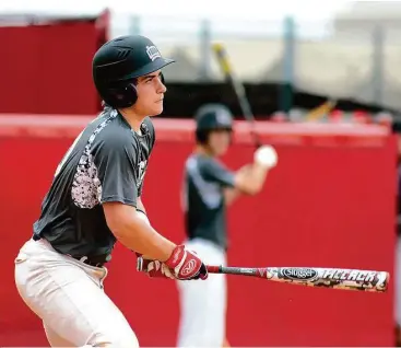  ?? Jerry Baker photos / For the Chronicle ?? Langham Creek junior catcher Michael Hoehner has been a terror at the plate this season.