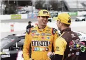  ?? STEVE HELBER AP ?? Kyle Busch, left, took the pole for Sunday’s race at Martinsvil­le Speedway, which is an advantage for pit position.