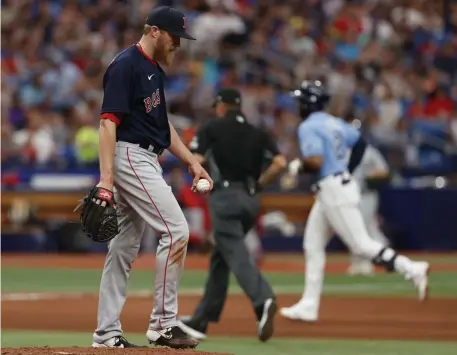  ?? Ap pHotos ?? SERVING ONE UP: Reliever Jake Diekman stands on the mound after giving up a home run to the Rays’ Yandy Diaz during the seventh inning of Sunday’s 5-2 loss. Below, interim manager Will Venable looks on with concern.