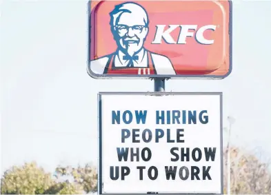  ?? LM OTERO/AP ?? A sign seeking workers is displayed Monday at a fast-food restaurant in Richardson, Texas, a Dallas suburb.