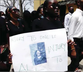  ??  ?? University of Uyo students in a procession for late Ini-Ubong