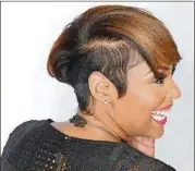  ??  ?? After image of client after Collins has styled and hidden her hair loss.