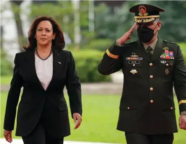  ?? AP PHOTO ?? MANILA▪ US Vice President Kamala Harris (left) reviews an honor guard at the Malacanang presidenti­al palace in Manila, Philippine­s on Monday, November 21, 2022▪