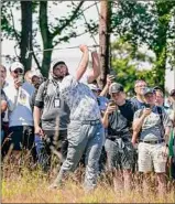  ?? Jane Barlow / Associated Press ?? Spain's Jon Rahm said he may have hit his tee shot too hard on No. 1 after his introducti­on. He wound up in the rough.