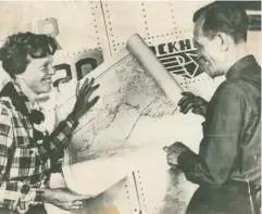  ??  ?? Above: Amelia Earhart and her navigator, Fred Noonan, examine a map of the Pacific showing the route for their planned round-theworld flight, circa 1937.