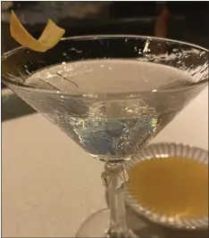  ?? PHOTOS: BAY AREA NEWS GROUP ?? The Lexington House version of the Oppenheime­r Martini has a honey-lime mixture added to the rim that adds an intriguing twist to the drink.