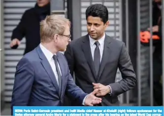  ?? — AFP ?? BERN: Paris Saint-Germain president and beIN Media chief Nasser al-Khelaifi (right) follows spokesman for the Swiss attorney general Andre Marty for a statment to the press after his hearing on the latest World Cup corruption probe.