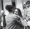  ?? PATRICK SEMANSKY/AP ?? Simone Kaplan hugs her mother, Alana, after reaching the final round of the Scripps National Spelling Bee in May.