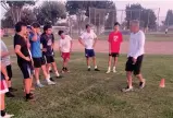  ?? RECORDER PHOTO BY CHARLES WHISNAND ?? Vinicio Bravo talks to South Valley Chivas players on Thursday at Burton Middle School.