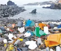  ?? THE NEW YORK TIMES ?? Plastic debris on a beach in Azores, Portugal, is shown in this undated photo.