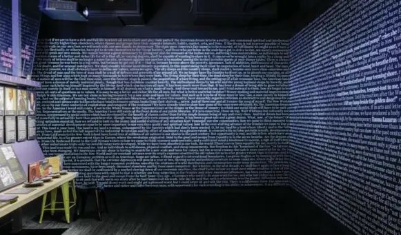  ?? WHITTEN SABBATINI/THE NEW YORK TIMES ?? The Word Waterfall exhibit, a wall of densely packed, seemingly random words revealed through a constantly looping light projection, at the American Writers Museum, in Chicago.