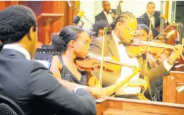  ?? ?? A small section of the 40-member strong Philharmon­ic Orchestra of Jamaica.