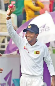  ??  ?? Akila Dananjaya celebrates his debut five-for