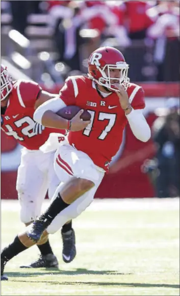  ?? JOHN BLAINE — FOR THE TRENTONIAN ?? Rutgers quarterbac­k Giovanni Rescigno carries the ball during the second half of Saturday’s Big Ten game against Illinois.