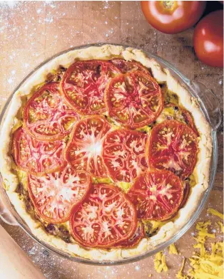  ?? COLTER PETERSON/ST. LOUIS POST-DISPATCH PHOTOS ?? This pie is filled with three pounds of tomatoes.