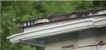  ?? Getty Images pHotos ?? TIME FOR FIXES: The gutters on this home have pulled away from the house and sections of the gutter have separated.