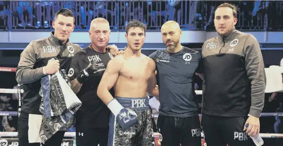  ??  ?? Josh Kelly and his winning team. All pictures by Lawerence Lustig/Matchroom Ringside photos and Mark Robinson/Matchroom Backstage photograph­y.