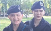  ?? WASSANA NANUAM ?? Lesbian couple Sgt Naphat Multakorn, left, and volunteer ranger Wanida Thosawa, have asked to get married.