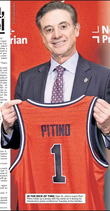  ?? ?? IN THE RICK OF TIME: New St. John’s coach Rick Pitino holds up a jersey with his name on it during his introducto­ry press conference Tuesday at the Garden.