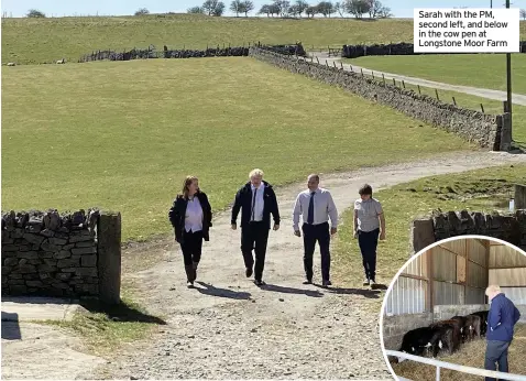  ??  ?? Sarah with the PM, second left, and below in the cow pen at Longstone Moor Farm