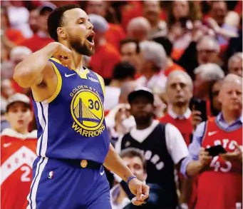  ??  ?? STEPHEN Curry #30 of the Golden State Warriors reacts against the Toronto Raptors in the second half during Game Five of the 2019 NBA Finals at Scotiabank Arena on June 10, 2019 in Toronto, Canada. (Getty Images)