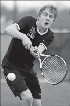  ?? SARAH GORDON/THE DAY ?? Stonington’s William Michelson reaches down for a return during his win at No. 2 singles on Tuesday. Michelson was the Bears’ lone winner in a 6-1 loss to East Lyme in a late-season match between ECC divisional winners and unbeatens at Stonington. East Lyme’s Finn Power makes his backhand return during his win at No. 1 singles in the Vikings’ 6-1 win over Stonington on Tuesday in a late-season battle of ECC divisional winners and unbeatens.