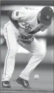  ?? AP/ORLIN WAGNER ?? Royals second baseman Whit Merrifield commits an error on a ground ball hit by Detroit’s Nicholas Castellano­s Wednesday during Kansas City’s loss to the Tigers at Kauffman Stadium in Kansas City, Mo.