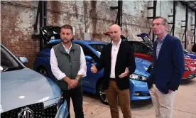  ?? Photograph: Joel Carrett/AAP ?? NSW transport and roads minister (left), Andrew Constance, NSW energy and environmen­t minister, Matt Kean and NSW treasurer Dominic Perrottet inspect electric cars at Sydney’s Carriagewo­rks in June.