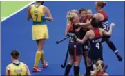  ?? DARIO LOPEZ-MILLS — THE ASSOCIATED PRESS ?? United States players celebrate after scoring against Australia.