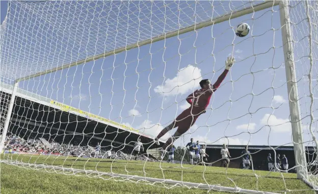  ?? ?? St Johnstone keeper Remi Matthews can’t get to the free-kick by Aberdeen’s Leighton Clarkson which turned out to be the winner at Mcdiarmid Park