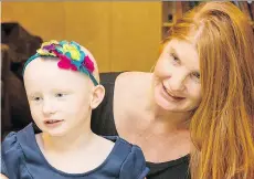  ?? THE CANADIAN PRESS/TERRY FOX RESEARCH FOUNDATION ?? Marlow Ploughman, 8, of Shannonvil­le, Ont., seen with her mother Tanya Boehm, was diagnosed with a muscle cancer at age 21/2.