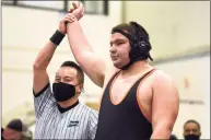  ?? Dave Stewart / Hearst Connecticu­t Media ?? Shelton’s Matt Weiner has his hand raised after winning the 285-pound weight class championsh­ip during the Class L wrestling finals on Saturday, Feb. 19.