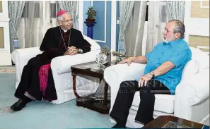  ??  ?? Royal audience: Sultan Ibrahim speaking with Archbishop Marino at Istana Pasir Pelangi in Johor Baru.