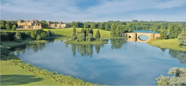  ??  ?? Blenheim Palace, with its gardens, lakes and the Vanbrugh Bridge. The view was once described by Lord Randolph Churchill, father of wartime leader Sir Winston, as the ‘finest in England’