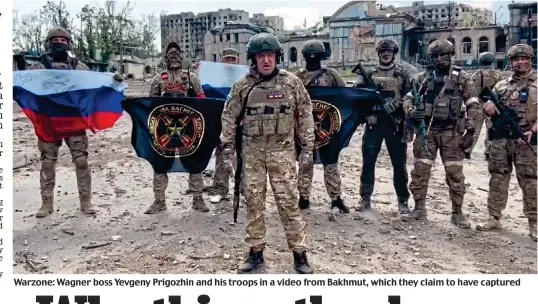  ?? ?? Warzone: Wagner boss Yevgeny Prigozhin and his troops in a video from Bakhmut, which they claim to have captured